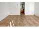 A tiled-floor room with a view into an adjacent bathroom at 41220 N Belfair Way, Anthem, AZ 85086