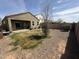 Backyard with gravel, covered patio, and partial grass at 4729 E Chromium Rd, San Tan Valley, AZ 85143