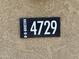 Close-up of the house number plaque showing the address 4729 at 4729 E Chromium Rd, San Tan Valley, AZ 85143