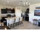 Spacious kitchen boasting a central island, stainless steel appliances, and ample counter space at 4729 E Chromium Rd, San Tan Valley, AZ 85143