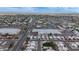 Wide aerial view of a neighborhood showcasing its proximity to shopping centers and streets at 5109 W Sanna St, Glendale, AZ 85302