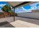 Spacious backyard featuring a concrete patio and neutral color gravel at 5109 W Sanna St, Glendale, AZ 85302