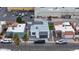 Charming single-Gathering home with a modern design, a garage and mature palm trees at 5109 W Sanna St, Glendale, AZ 85302