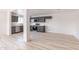 Bright, open kitchen with stainless appliances, grey cabinets, and bright, white countertops at 5109 W Sanna St, Glendale, AZ 85302
