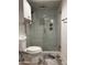 Updated bathroom with glass-enclosed shower and modern fixtures at 5132 N 31St Way # 123, Phoenix, AZ 85016
