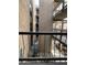 Exterior view of the condo complex reveals maintained walkways, accessible staircases, and a tidy shared outdoor space at 5132 N 31St Way # 123, Phoenix, AZ 85016