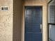 Close-up of a front door with a unit number and neutral exterior paint at 5132 N 31St Way # 123, Phoenix, AZ 85016
