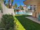 The pool area shows meticulously maintained landscaping and inviting common areas perfect for outdoor relaxation and enjoyment at 5132 N 31St Way # 123, Phoenix, AZ 85016
