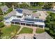 Expansive backyard featuring a private pool, covered patio, and solar panels at 521 E Horseshoe Ave, Gilbert, AZ 85296