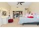 Stylish bedroom featuring ample closet space, makeup vanity, and a comfortable bed at 521 E Horseshoe Ave, Gilbert, AZ 85296