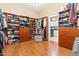 Walk-in closet with custom shelving and ample storage space makes organization a breeze in this stylish home at 521 E Horseshoe Ave, Gilbert, AZ 85296