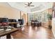Large dining room with hardwood floors and a stunning bay window for natural light at 521 E Horseshoe Ave, Gilbert, AZ 85296
