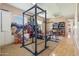 Spacious workout area with weightlifting equipment, bright windows, and plenty of storage at 521 E Horseshoe Ave, Gilbert, AZ 85296
