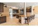 Expansive kitchen with a large island, granite countertops, and ample cabinet space at 521 E Horseshoe Ave, Gilbert, AZ 85296