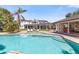 Sparkling pool offering stunning views of the expansive backyard, custom gazebo, and luxurious home at 521 E Horseshoe Ave, Gilbert, AZ 85296