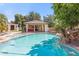 Inviting pool area with a spacious gazebo and lounge chairs, perfect for outdoor relaxation and entertainment at 521 E Horseshoe Ave, Gilbert, AZ 85296