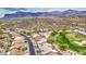 Stunning aerial view of a community with golf course and mountain views at 5289 S Red Yucca Ln, Gold Canyon, AZ 85118
