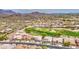 Aerial view of neighborhood showcasing golf course and desert landscape at 5289 S Red Yucca Ln, Gold Canyon, AZ 85118