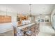 Spacious dining room features a chandelier, tile floors, and access to other living spaces at 5289 S Red Yucca Ln, Gold Canyon, AZ 85118