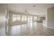 Spacious living room with tile floors, large windows, and backyard views at 5289 S Red Yucca Ln, Gold Canyon, AZ 85118