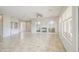 Bright and open living space with tile flooring, fireplace, and neutral wall paint at 5289 S Red Yucca Ln, Gold Canyon, AZ 85118
