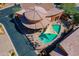 Aerial view showcasing community amenities, pool area, and neighborhood design at 5370 S Desert Dawn Dr # 30, Gold Canyon, AZ 85118