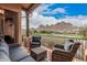 Balcony featuring comfortable seating with mountain and golf course views at 5370 S Desert Dawn Dr # 30, Gold Canyon, AZ 85118