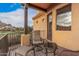 Balcony with views, featuring a chair and table at 5370 S Desert Dawn Dr # 30, Gold Canyon, AZ 85118