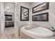 Relaxing bathroom with a soaking tub, elegant decor, and seamless access to the Primary bedroom at 5370 S Desert Dawn Dr # 30, Gold Canyon, AZ 85118