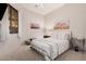 Inviting bedroom featuring a comfortable bed, window with blinds, and tasteful decor for a peaceful retreat at 5370 S Desert Dawn Dr # 30, Gold Canyon, AZ 85118