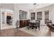 Elegant dining room featuring a modern chandelier and a dark wood table set for a meal at 5370 S Desert Dawn Dr # 30, Gold Canyon, AZ 85118