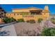 Toscano Villas exterior with landscaping and community signage at 5370 S Desert Dawn Dr # 30, Gold Canyon, AZ 85118