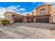 Gorgeous desert home featuring multiple garages, beautiful architecture and landscaping at 5370 S Desert Dawn Dr # 30, Gold Canyon, AZ 85118