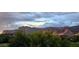 Beautiful landscape featuring a home in a desert setting with striking mountain views and an expansive cloudy sky at 5370 S Desert Dawn Dr # 30, Gold Canyon, AZ 85118