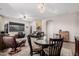 Expansive living area combining living & dining spaces, featuring sleek furnishings, and abundant natural light at 5370 S Desert Dawn Dr # 30, Gold Canyon, AZ 85118