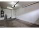 Clean, empty garage with water heater at 5415 E Mckellips Rd # 104, Mesa, AZ 85215