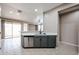 Well-equipped kitchen featuring stainless steel appliances, gray cabinetry, and ample counter space at 5415 E Mckellips Rd # 104, Mesa, AZ 85215