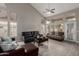Cozy living room area featuring tall ceilings and large windows to let in natural light at 6014 E Sayan Cir, Mesa, AZ 85215