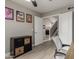 This home office features wood-look floors, a doorway, and a dark storage unit at 6014 E Sayan Cir, Mesa, AZ 85215