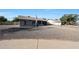 A charming single-story brick home with a well-kept rock front yard and a concrete driveway at 6029 W Pershing Ave, Glendale, AZ 85304