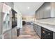 Well-designed kitchen with stainless steel appliances and granite counters, creating a pleasing culinary environment at 6029 W Pershing Ave, Glendale, AZ 85304