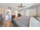 Comfortable bedroom with a ceiling fan, closet space, and natural light, ideal for a relaxing retreat at 6029 W Pershing Ave, Glendale, AZ 85304