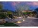 Backyard patio with a fire pit and outdoor seating for entertaining at 6888 E Mighty Saguaro Way, Scottsdale, AZ 85266