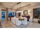 Elegant dining room with stylish lighting and large table for entertaining at 6888 E Mighty Saguaro Way, Scottsdale, AZ 85266