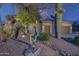 Desert landscaping in front of exterior home at 6888 E Mighty Saguaro Way, Scottsdale, AZ 85266