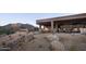 Inviting outdoor patio area with comfortable seating, fire pits, and scenic mountain views, perfect for relaxing and entertaining at 6888 E Mighty Saguaro Way, Scottsdale, AZ 85266