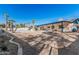 Spacious backyard features a pool, covered patio, and palm trees, perfect for entertaining at 7416 S Mcallister Ave, Tempe, AZ 85283