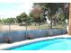 Relaxing pool with inviting blue water, manicured greenery, and views of the surrounding community at 7416 S Mcallister Ave, Tempe, AZ 85283