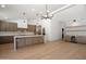 Modern kitchen with stainless steel appliances, white countertop, and a large island at 7528 E Windrose Dr, Scottsdale, AZ 85260
