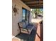 Inviting outdoor patio area with comfortable seating and desert plants at 907 E Lancaster Cir, Florence, AZ 85132